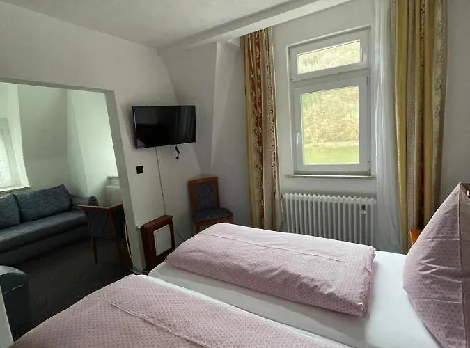 Cafe Moselterrasse Гостевой дом 3*